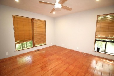 Remodel has been started leaving it up to a new buyer to on Cortez Golf Course in Arkansas - for sale on GolfHomes.com, golf home, golf lot