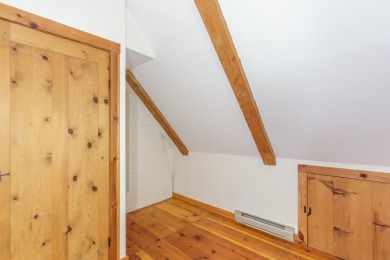 Tucked at the end of a quiet cul-de-sac, this post-and-beam cape on Eastman Golf Links in New Hampshire - for sale on GolfHomes.com, golf home, golf lot