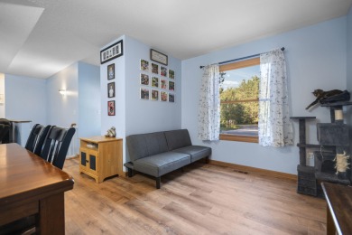 This beautifully designed home offers the perfect blend of on Michaywe Pines Course in Michigan - for sale on GolfHomes.com, golf home, golf lot