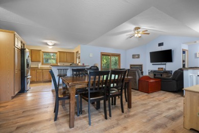 This beautifully designed home offers the perfect blend of on Michaywe Pines Course in Michigan - for sale on GolfHomes.com, golf home, golf lot