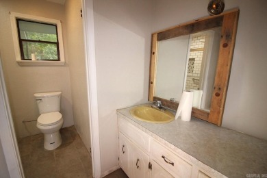 Remodel has been started leaving it up to a new buyer to on Cortez Golf Course in Arkansas - for sale on GolfHomes.com, golf home, golf lot
