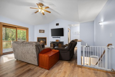 This beautifully designed home offers the perfect blend of on Michaywe Pines Course in Michigan - for sale on GolfHomes.com, golf home, golf lot