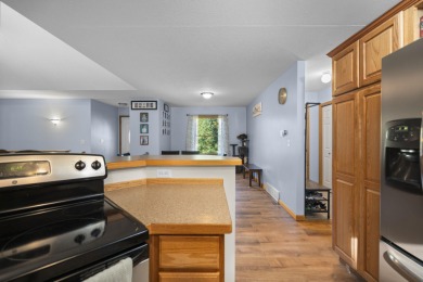 This beautifully designed home offers the perfect blend of on Michaywe Pines Course in Michigan - for sale on GolfHomes.com, golf home, golf lot