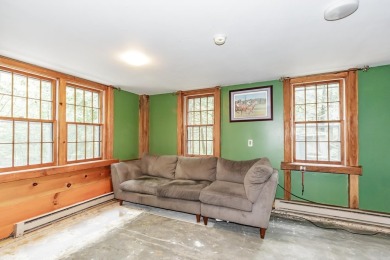 Tucked at the end of a quiet cul-de-sac, this post-and-beam cape on Eastman Golf Links in New Hampshire - for sale on GolfHomes.com, golf home, golf lot