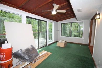 Remodel has been started leaving it up to a new buyer to on Cortez Golf Course in Arkansas - for sale on GolfHomes.com, golf home, golf lot