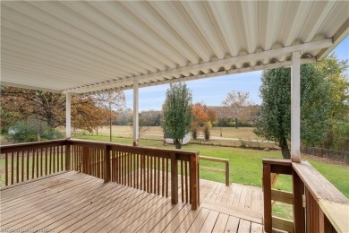 Discover the perfect blend of comfort and outdoor accessibility on Choctaw Country Club in Oklahoma - for sale on GolfHomes.com, golf home, golf lot