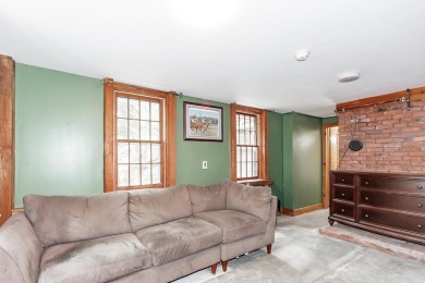 Tucked at the end of a quiet cul-de-sac, this post-and-beam cape on Eastman Golf Links in New Hampshire - for sale on GolfHomes.com, golf home, golf lot
