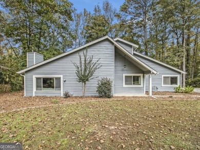 Perfectly located! This lovely home backs up to White Oak Golf on Canongate On White Oak Golf Course in Georgia - for sale on GolfHomes.com, golf home, golf lot