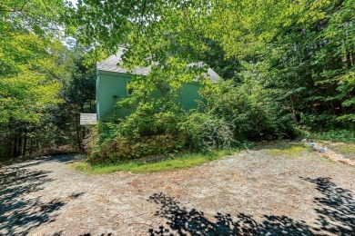 Tucked at the end of a quiet cul-de-sac, this post-and-beam cape on Eastman Golf Links in New Hampshire - for sale on GolfHomes.com, golf home, golf lot