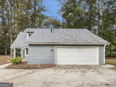 Perfectly located! This lovely home backs up to White Oak Golf on Canongate On White Oak Golf Course in Georgia - for sale on GolfHomes.com, golf home, golf lot