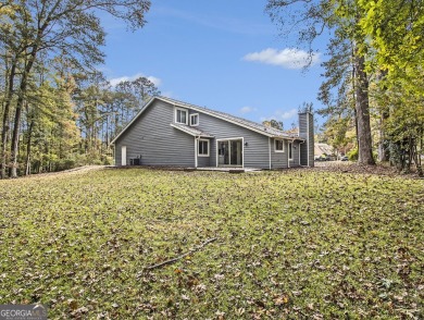 Perfectly located! This lovely home backs up to White Oak Golf on Canongate On White Oak Golf Course in Georgia - for sale on GolfHomes.com, golf home, golf lot