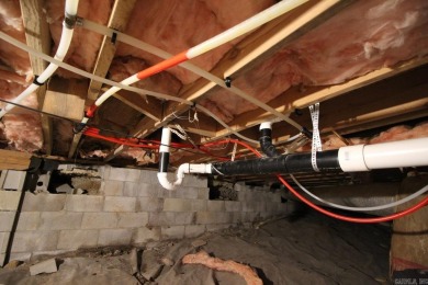 Remodel has been started leaving it up to a new buyer to on Cortez Golf Course in Arkansas - for sale on GolfHomes.com, golf home, golf lot