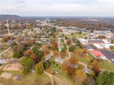 Discover the perfect blend of comfort and outdoor accessibility on Choctaw Country Club in Oklahoma - for sale on GolfHomes.com, golf home, golf lot