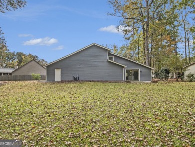 Perfectly located! This lovely home backs up to White Oak Golf on Canongate On White Oak Golf Course in Georgia - for sale on GolfHomes.com, golf home, golf lot