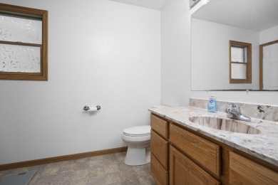 This beautifully designed home offers the perfect blend of on Michaywe Pines Course in Michigan - for sale on GolfHomes.com, golf home, golf lot