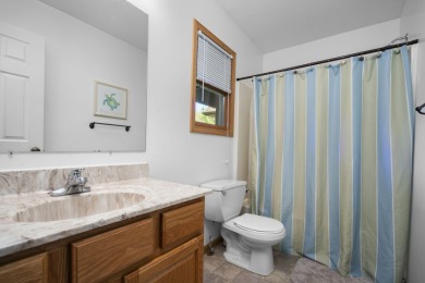 This beautifully designed home offers the perfect blend of on Michaywe Pines Course in Michigan - for sale on GolfHomes.com, golf home, golf lot