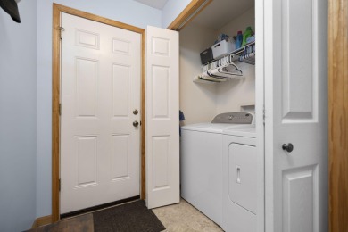 This beautifully designed home offers the perfect blend of on Michaywe Pines Course in Michigan - for sale on GolfHomes.com, golf home, golf lot