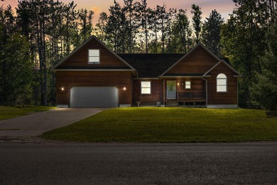 This beautifully designed home offers the perfect blend of on Michaywe Pines Course in Michigan - for sale on GolfHomes.com, golf home, golf lot