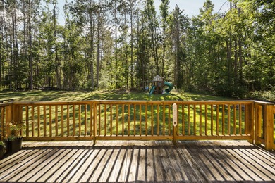 This beautifully designed home offers the perfect blend of on Michaywe Pines Course in Michigan - for sale on GolfHomes.com, golf home, golf lot