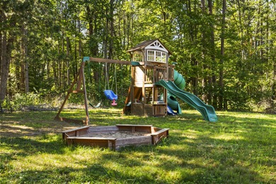 This beautifully designed home offers the perfect blend of on Michaywe Pines Course in Michigan - for sale on GolfHomes.com, golf home, golf lot