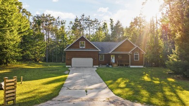 This beautifully designed home offers the perfect blend of on Michaywe Pines Course in Michigan - for sale on GolfHomes.com, golf home, golf lot