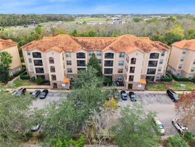 Enjoy vacationing, or living in this first floor condo that on ChampionsGate Golf Resort in Florida - for sale on GolfHomes.com, golf home, golf lot
