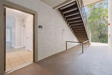 Enjoy vacationing, or living in this first floor condo that on ChampionsGate Golf Resort in Florida - for sale on GolfHomes.com, golf home, golf lot