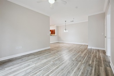 Enjoy vacationing, or living in this first floor condo that on ChampionsGate Golf Resort in Florida - for sale on GolfHomes.com, golf home, golf lot