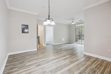 Enjoy vacationing, or living in this first floor condo that on ChampionsGate Golf Resort in Florida - for sale on GolfHomes.com, golf home, golf lot