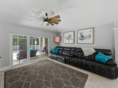 Step into modern comfort and style with this stunning 4-bedroom on Lexington Oaks Golf Club in Florida - for sale on GolfHomes.com, golf home, golf lot
