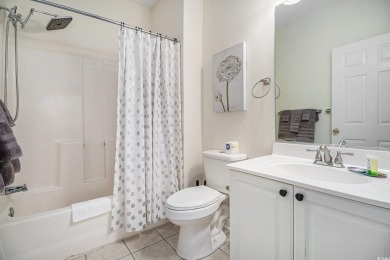 This beautifully updated, light-filled 2-bedroom, 2-bathroom on Barefoot Resort and Golf Club  in South Carolina - for sale on GolfHomes.com, golf home, golf lot
