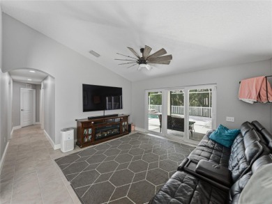 Step into modern comfort and style with this stunning 4-bedroom on Lexington Oaks Golf Club in Florida - for sale on GolfHomes.com, golf home, golf lot