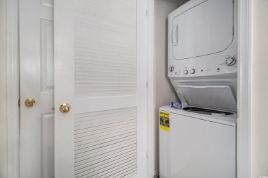 This beautifully updated, light-filled 2-bedroom, 2-bathroom on Barefoot Resort and Golf Club  in South Carolina - for sale on GolfHomes.com, golf home, golf lot