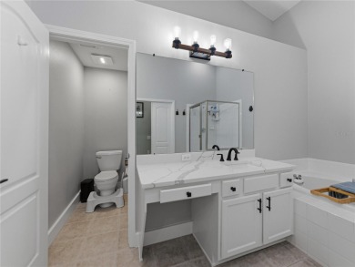 Step into modern comfort and style with this stunning 4-bedroom on Lexington Oaks Golf Club in Florida - for sale on GolfHomes.com, golf home, golf lot