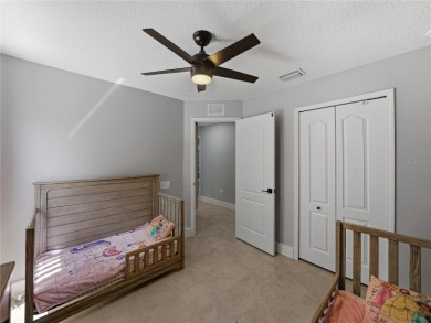Step into modern comfort and style with this stunning 4-bedroom on Lexington Oaks Golf Club in Florida - for sale on GolfHomes.com, golf home, golf lot