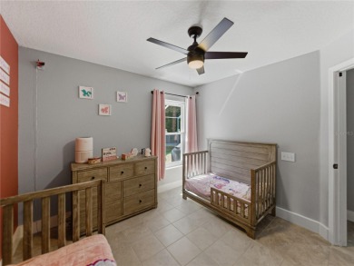 Step into modern comfort and style with this stunning 4-bedroom on Lexington Oaks Golf Club in Florida - for sale on GolfHomes.com, golf home, golf lot