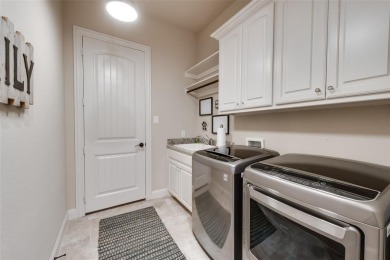 Stunning custom, lakefront home located in the 24 hr gated & on The Golf Club at Resort Eagle Mountain Lake in Texas - for sale on GolfHomes.com, golf home, golf lot
