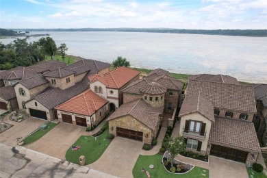 Stunning custom, lakefront home located in the 24 hr gated & on The Golf Club at Resort Eagle Mountain Lake in Texas - for sale on GolfHomes.com, golf home, golf lot