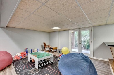 Nestled on a quiet cul-de-sac street just steps from the on Country Club of Roswell in Georgia - for sale on GolfHomes.com, golf home, golf lot