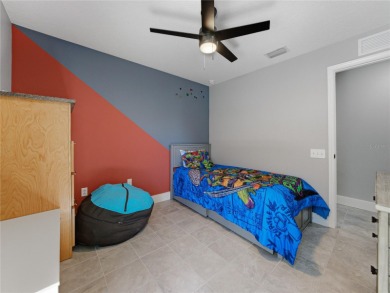 Step into modern comfort and style with this stunning 4-bedroom on Lexington Oaks Golf Club in Florida - for sale on GolfHomes.com, golf home, golf lot