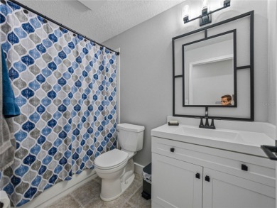 Step into modern comfort and style with this stunning 4-bedroom on Lexington Oaks Golf Club in Florida - for sale on GolfHomes.com, golf home, golf lot