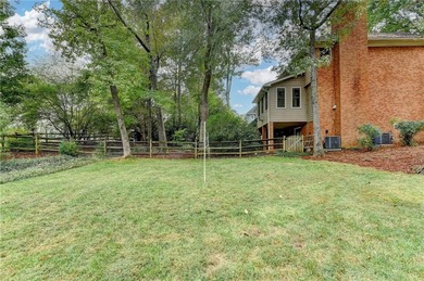 Nestled on a quiet cul-de-sac street just steps from the on Country Club of Roswell in Georgia - for sale on GolfHomes.com, golf home, golf lot