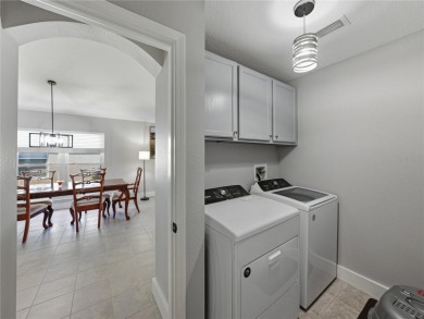 Step into modern comfort and style with this stunning 4-bedroom on Lexington Oaks Golf Club in Florida - for sale on GolfHomes.com, golf home, golf lot