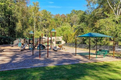 Nestled on a quiet cul-de-sac street just steps from the on Country Club of Roswell in Georgia - for sale on GolfHomes.com, golf home, golf lot