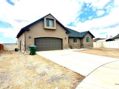 Excellent location and a wonderful layout for this home. Seller on Dinaland Golf Course in Utah - for sale on GolfHomes.com, golf home, golf lot