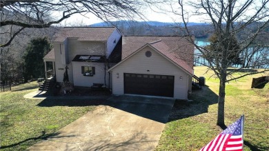 True lake front home with an amazing price adjustment! This on Holiday Island Executive Golf Course in Arkansas - for sale on GolfHomes.com, golf home, golf lot