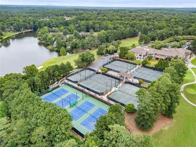 Nestled on a quiet cul-de-sac street just steps from the on Country Club of Roswell in Georgia - for sale on GolfHomes.com, golf home, golf lot