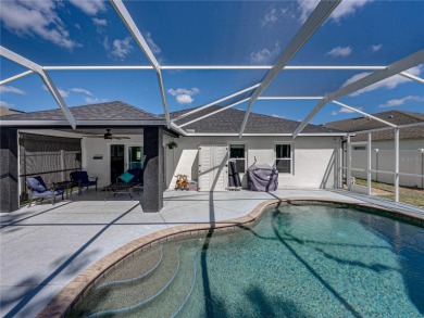 Step into modern comfort and style with this stunning 4-bedroom on Lexington Oaks Golf Club in Florida - for sale on GolfHomes.com, golf home, golf lot