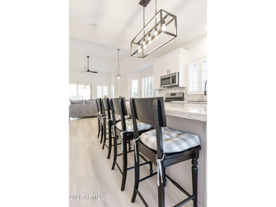 Resort-style living with stunning LAKE, GOLF course, and on Oakwood Golf Club  in Arizona - for sale on GolfHomes.com, golf home, golf lot