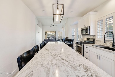 Resort-style living with stunning LAKE, GOLF course, and on Oakwood Golf Club  in Arizona - for sale on GolfHomes.com, golf home, golf lot